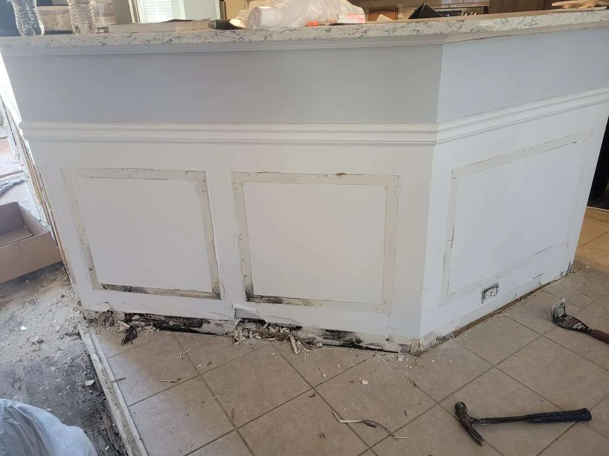 Water damage and mold on kitchen during Storm Damage Restoration in Sunrise